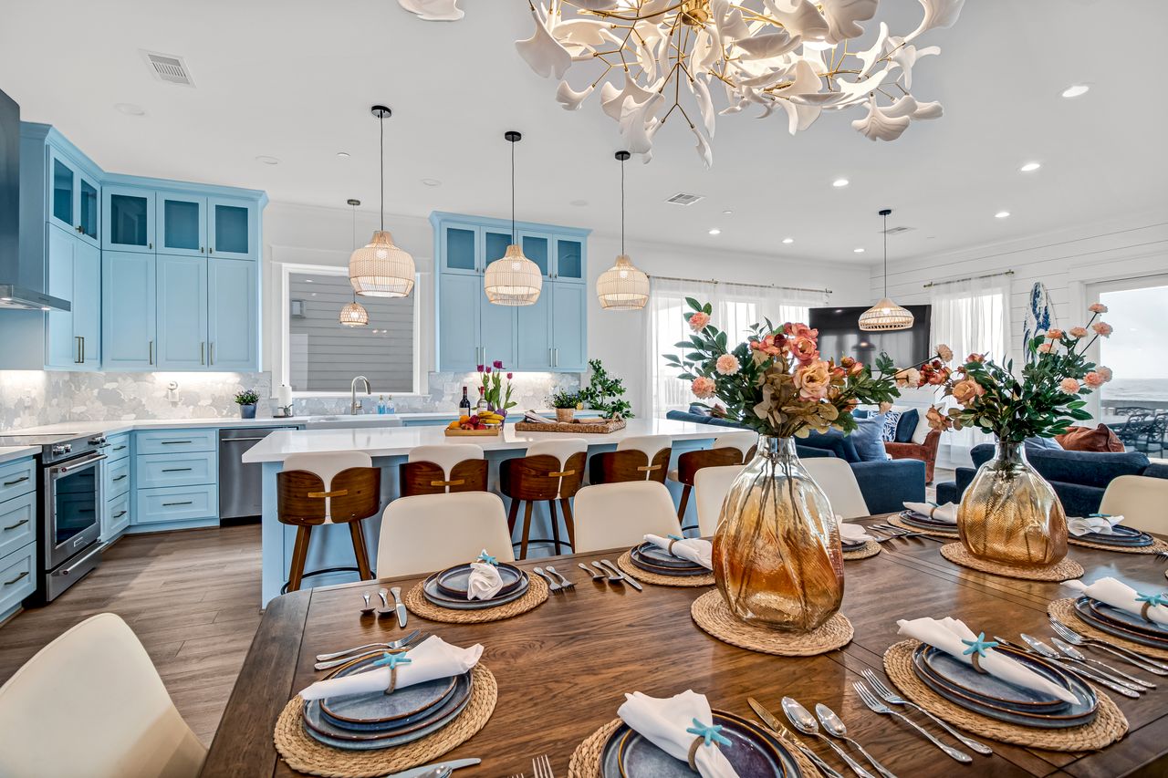Open-concept kitchen and dining area at Grand Beach Retreat